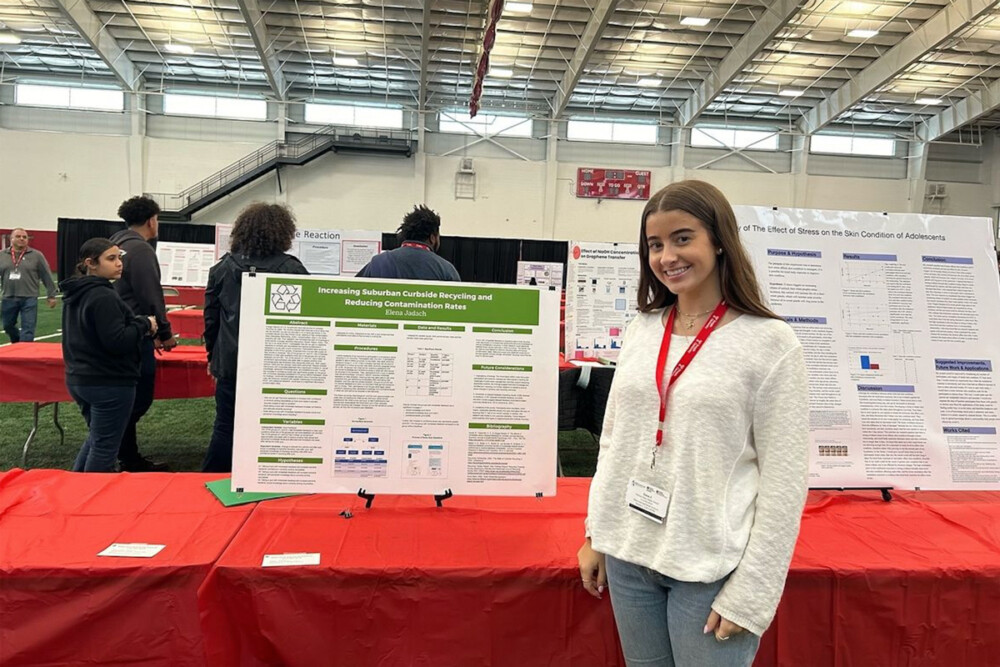  Elena Jadach is presenting her research on recycling at George Washington Carver's 2024 Science Fair