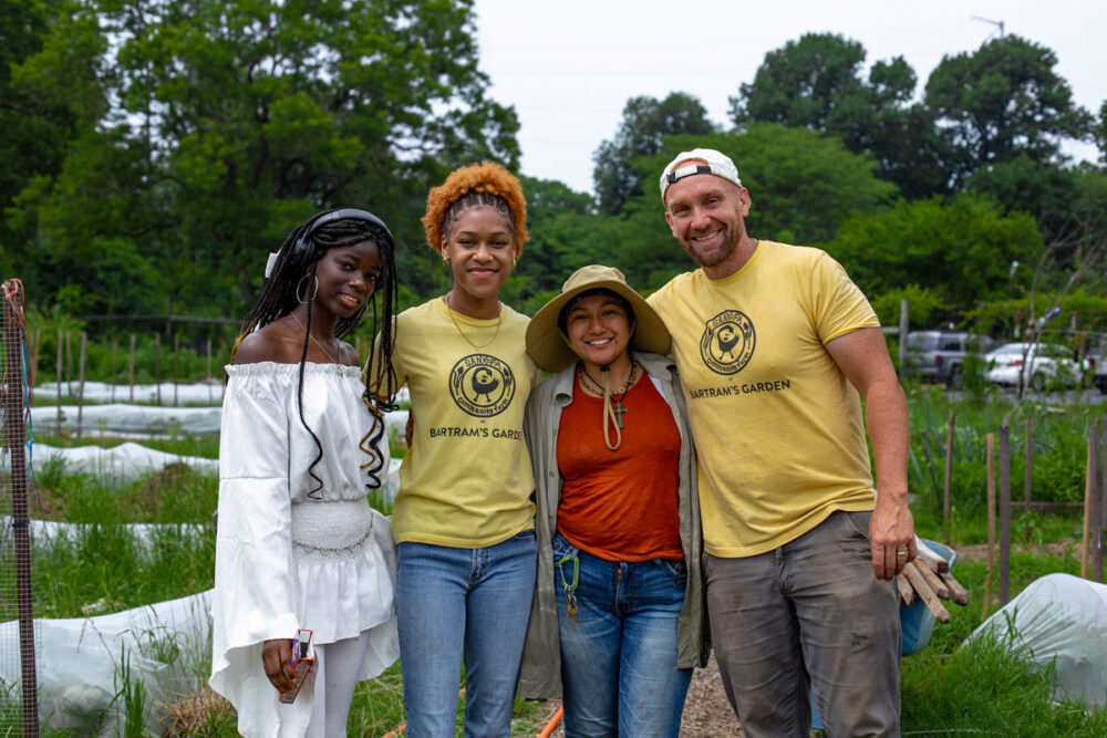 Youth workers Hawa Camara and Ain Dantzler with the staff at Bartram's Garden, Sankofa Community Farm.